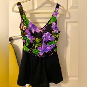 White stag swimsuit has shelf bra, panty attached, and over skirt